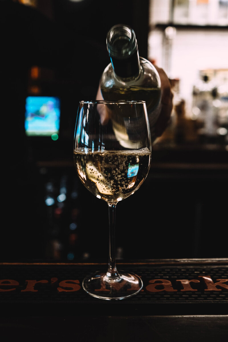 Wine being poured into wine glass